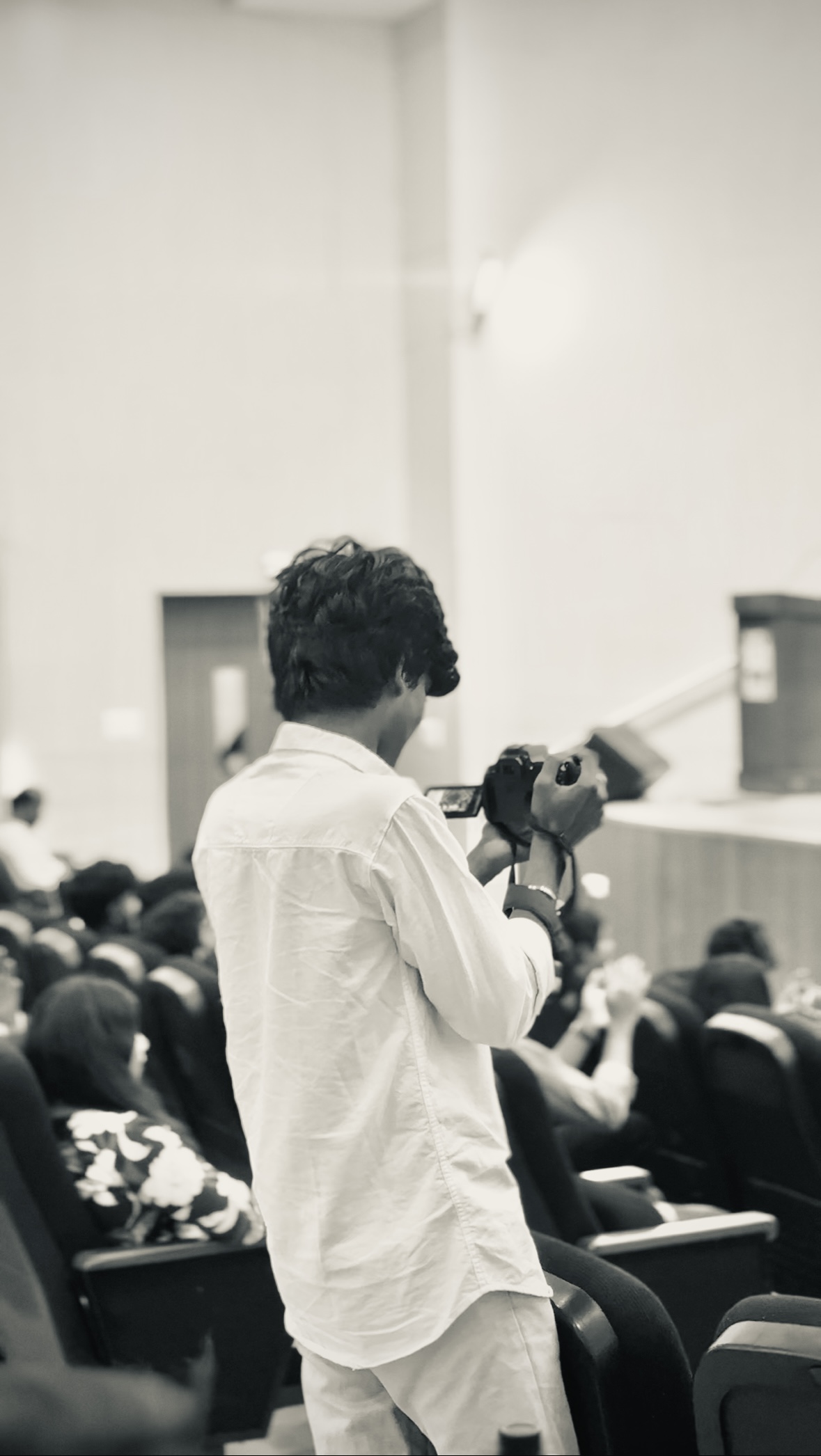 Udhaya Bharathi E filming an event